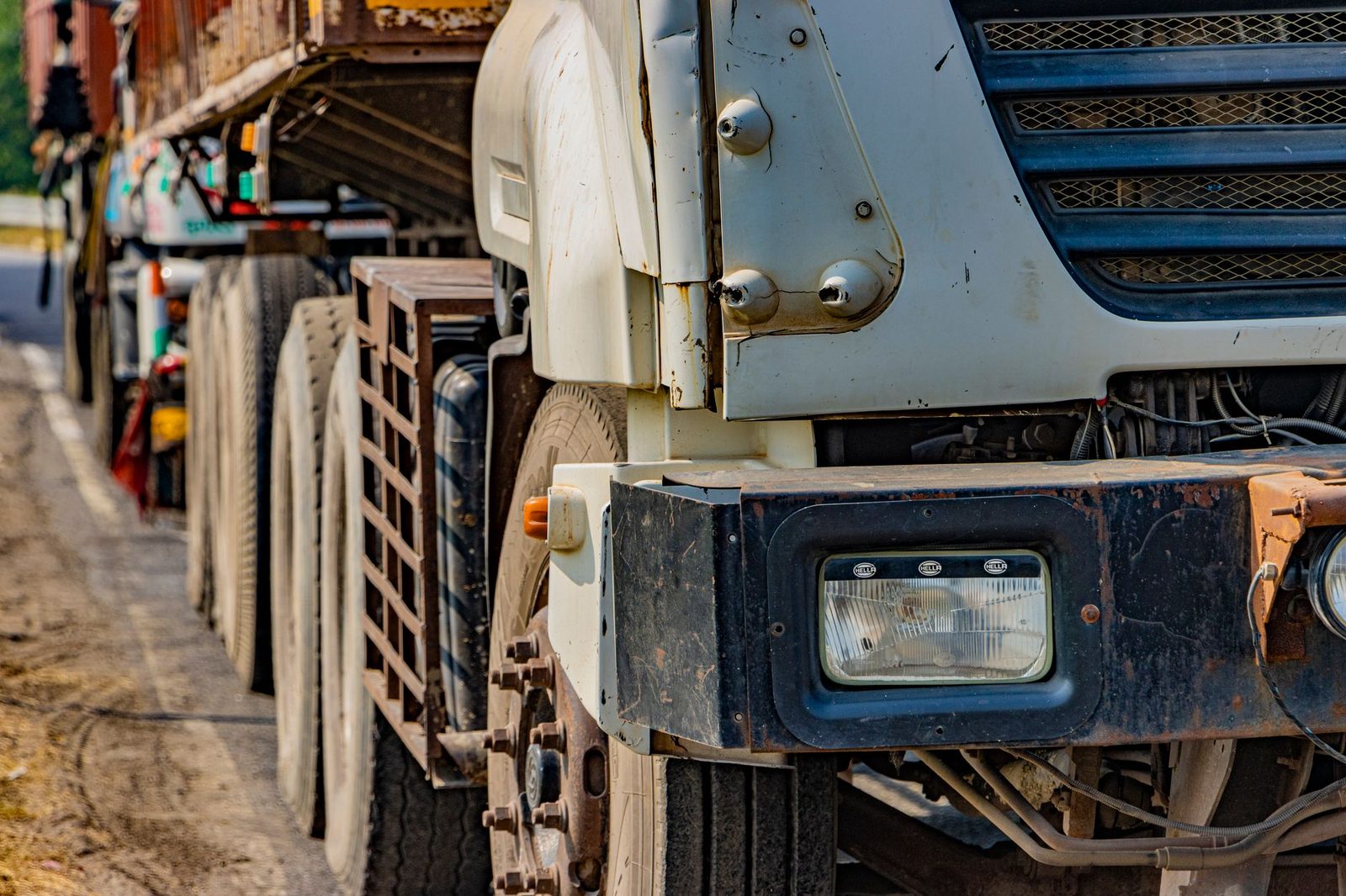 Large commercial truck on highway representing transportation and logistics services.